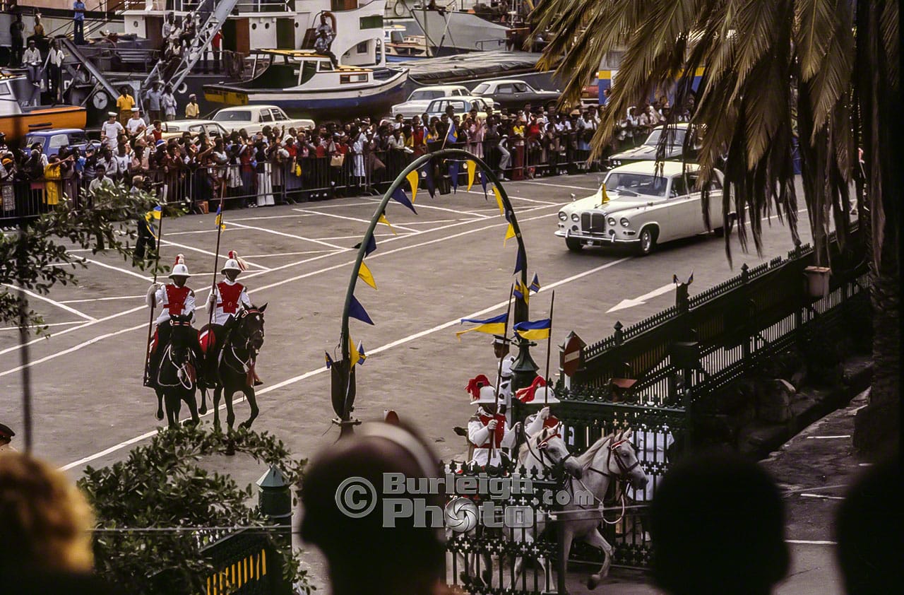 Queen Elizabeth's procession is greeted by the crowds in Trafalgar Sq as she arrives at the Barbados Public Buildings, Silver Jubilee, 1977