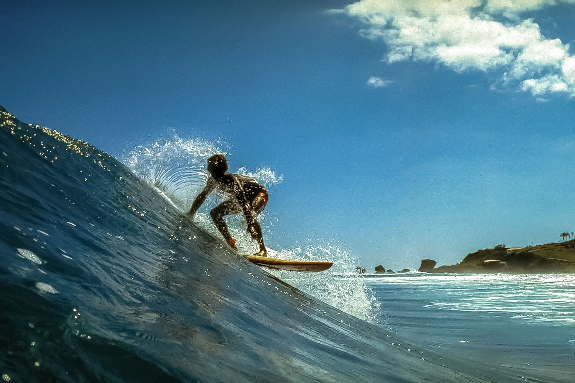 Saint surfs Soup Bowl on Barbados' East Coast
